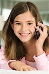 Portrait of a girl talking on a mobile phone