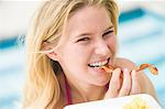 Portrait of a woman eating salad