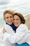 Teenage boy hugging his grandmother