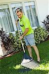 Man raking the lawn