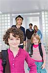 Children with a nanny leaving for school