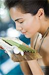 Woman smelling incenses