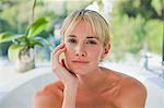 Portrait of a woman in a bathtub