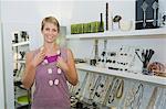 Woman wearing a necklace in a jewelry store