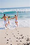 Family enjoying vacations on the beach