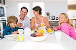 Family having breakfast at the dining table