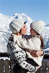 Mother and daughter hugging