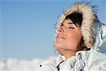 Young woman enjoying winter sun