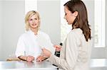 Woman reading a medical report