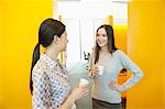 Businesswomen drinking tea in an office