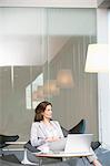 Businesswoman waiting in an office
