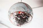 Low angle view of a mirrored disco ball in a nightclub