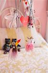 Close-up of wind chime decorated in a bedroom