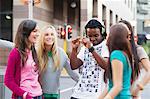 Friends dancing on the road