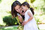 Woman and her granddaughter reading a text message