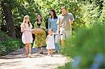 Happy multi generation family enjoying in the garden