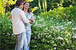 Happy mature couple romancing in a garden