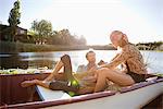 Young couple romancing in the boat