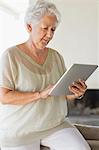 Senior woman using a digital tablet