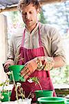 Man gardening and smiling