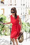 Woman moving up staircases, Montmartre, Paris, Ile-de-France, France