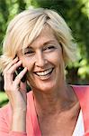 Woman talking on a mobile phone and smiling