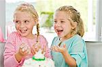 Two girls enjoying a birthday party