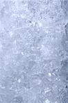 Full frame ice background, frozen water, blue