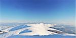 Snowy mountain ridges panoramic view. Carpathians. Polonyna Borzhava. Ukraine