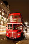 Route Master Bus in the street of London. Route Master Bus is the most iconic symbol of London as well as London's Black cabs.