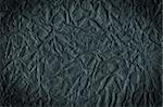 Black crumpled paper texture background