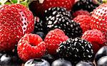 Mix from fresh berries on a table, a bilberry, a raspberry, a strawberry