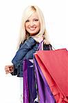 Young blond lady holding shopping bags isolated on white