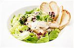 Classic Caesar salad with chicken on a plate