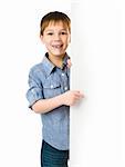 cute child behind a board over white background