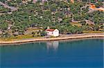 Mediterranean style chapel made of stone by the sea, Island Cres, Croatia