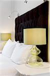 Luxurious modern bed design and bedside lamps