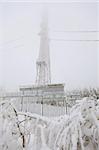 Radio transmitting tower frozen with a huge amounts of snow