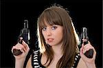 Attractive young woman with two pistol. Isolated