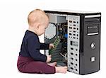 young child in blue shirt with open computer on white background