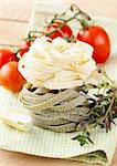 Italian pasta fettuccine with cherry tomatoes