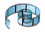 Old film strip in a spiral curl with blue light