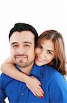 couple portrait smiling with a white background