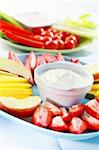 Raw  fruits and vegetables with cream cheese and yogurt dip