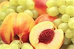 Bright, ripe grapes and nectarines