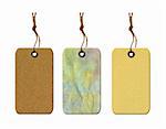 Vintage blank gift tags with string isolated on white background.