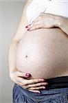 attractive girl waiting for child. studio shot