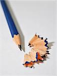 Sharpened Pencil with Wood Shavings on the blank paper