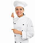 Stock image of female chef holding blank sign with copy space and isolated on white background