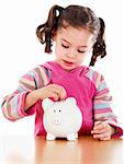 Stock image of little girl learning the value of saving